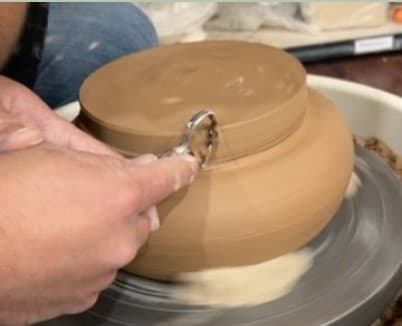 Trimming a large bowl on the wheel