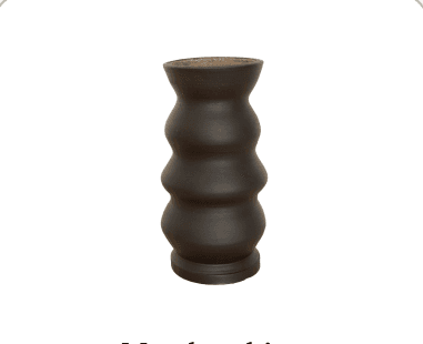 A dark ribbed vase